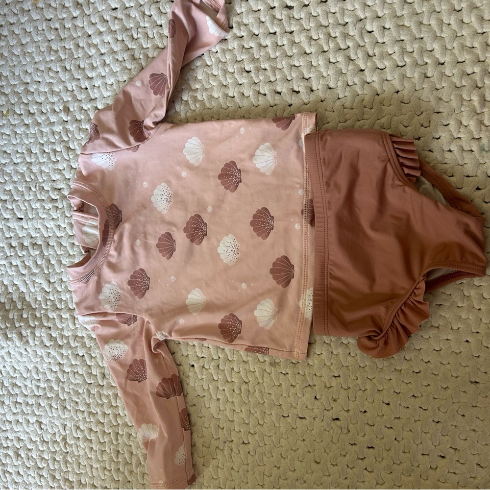 Petit Lem Pink Seashell Long sleeve swimsuit
